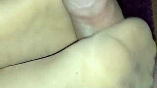 she strokes him off in sheer nylons teasing toes