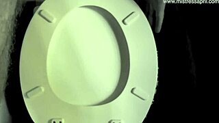 Dominatrix April interrogates bound slave in military camp