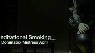 Dominatrix April interrogates bound slave in military camp