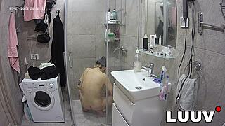 tattooed alice shaves smooth pussy flashes natural tits in shower for evening show