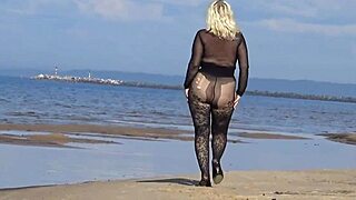 Isn't black babe flashing big ass on beach?