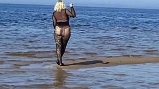 Isn't black babe flashing big ass on beach?