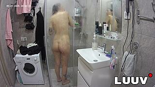 tattooed alice shaves smooth pussy flashes natural tits in shower for evening show