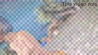 Petite redhead beauty teases topless with piercings on sunny beach ball day