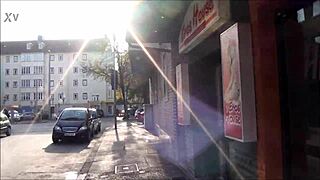 discover kaiserstraße hanover's vibrant sights as european tourist wanders german streets