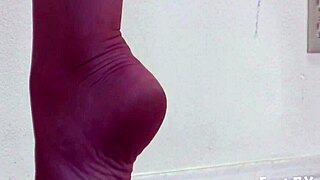 She pumps her bare feet and toes in erotic fetish play