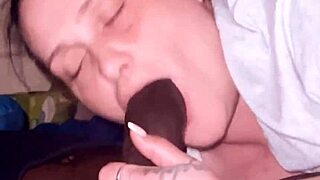 She goes deep on beautiful big black cock in homemade interracial blowjob