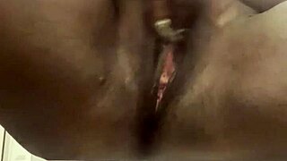 just out the shower im fingering my shaved ebony pussy wet