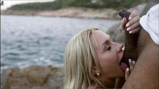 Blonde slut bends over beach rocks to fuck lifeguard with big cock rough!