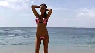 monika fox rocking pink bikini stars on beach posing those big fake tits 😍🏖️