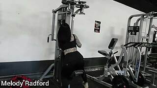 muscular milf bodybuilder slut mummified during gym workout