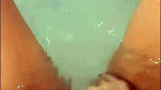 pretty blonde girlfriend fingers her wet pussy in hot tub till massive cumshot