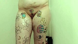 amateur curvy big tits tattooed babe soaps up dripping wet pussy and ass shaking