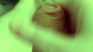 guy chills naked stroking his monster cock