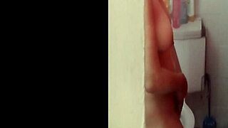 colombian big tits babe caught spying in shower, watch her huge boobs