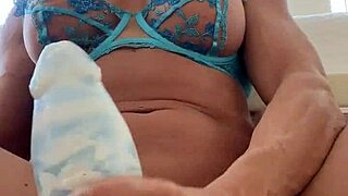 watch this muscular milf's huge clit stretch around massive dildo