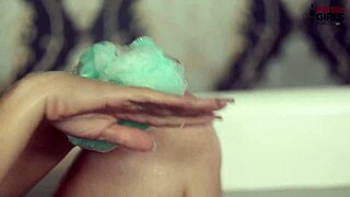 Lady Snow masturbates solo with dildo ending in golden shower