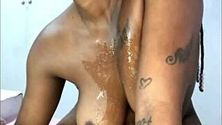 This nasty ebony housewife spits while getting her curvy pussy fucked hard by lover