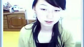 shy asian amateur slips off panties teasing her softcore curves solo