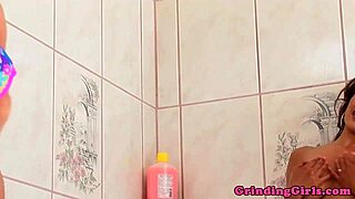 shower temptresses lather curves before diving into sapphic toy play