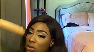 lexi butterfly slurps and spits on wall-mounted cock deeply