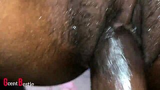 A beautiful African pussy stretched wide in super close-up detail