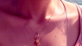 mature model strolls beach in sexy outfit teasing viewers naturally