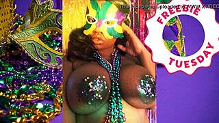 Jessica Grabbit flashes ebony big tits at Mardi Gras with rabbit toy.