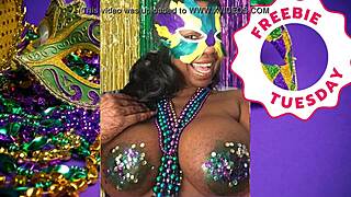 Jessica Grabbit flashes ebony big tits at Mardi Gras with rabbit toy.