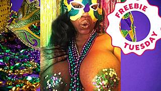 Jessica Grabbit flashes ebony big tits at Mardi Gras with rabbit toy.