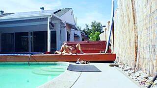 two cute teens make out poolside then scissor hard