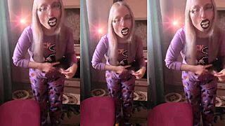 Blonde with glasses brushes her long hair sensually with lollipop in asmr whispers