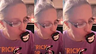 Blonde with glasses brushes her long hair sensually with lollipop in asmr whispers