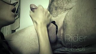 woman milks cock with mouth in bdsm domination scene