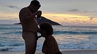 hotwife strips on beach for muscular stud's creampie pounding outdoors