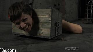 restrained cutie takes her punishment right there in the garage