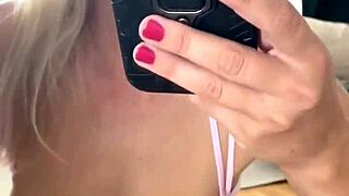 Busty Katerina Hartlova in lingerie masturbates juicy shaved pussy to mirror homemade