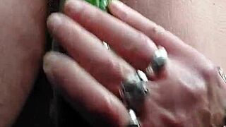 this old granny stuffs cucumber right into her hairy beaver