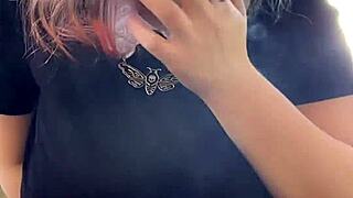 that alt milf neighbor lights up a smoke while flashing her huge natural tits out back