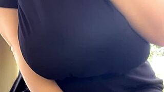 that alt milf neighbor lights up a smoke while flashing her huge natural tits out back