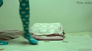 slender japanese rika miama strips shorts fingering her tits in solo webcam toy play.