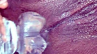 watch these ebony sluts double penetrate with huge dildos squirting
