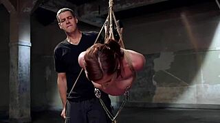 feel the thrill as bound redhead slave's tied tits heave during rough anal training and hardcore submission