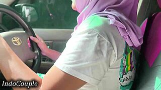 Indonesian hijab wife sucks boyfriend's cock while driving viral jakarta clip