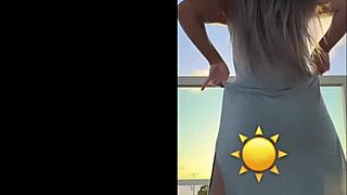 hot blonde dances sexy in see-through dress teasing her curves