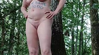 this humiliated milf slave flashes tits bent over doggystyle in forest