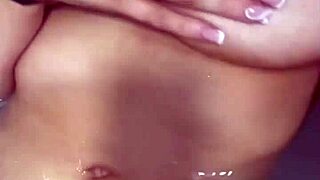 She fingers herself wildly in shower till squirting orgasm hits hard