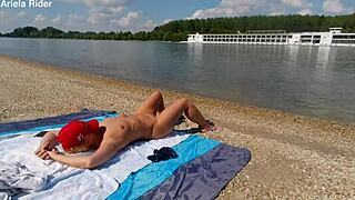Ariela Rider flashes shaved pussy publicly on Danube bank, wanna watch?