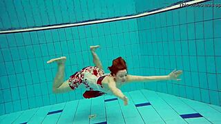 hot teen marketa dives underwater in bikini at pool and beach