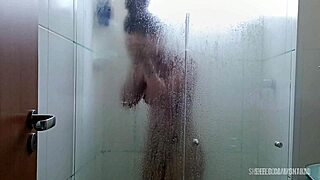fit brunette showers her athletic curves wet